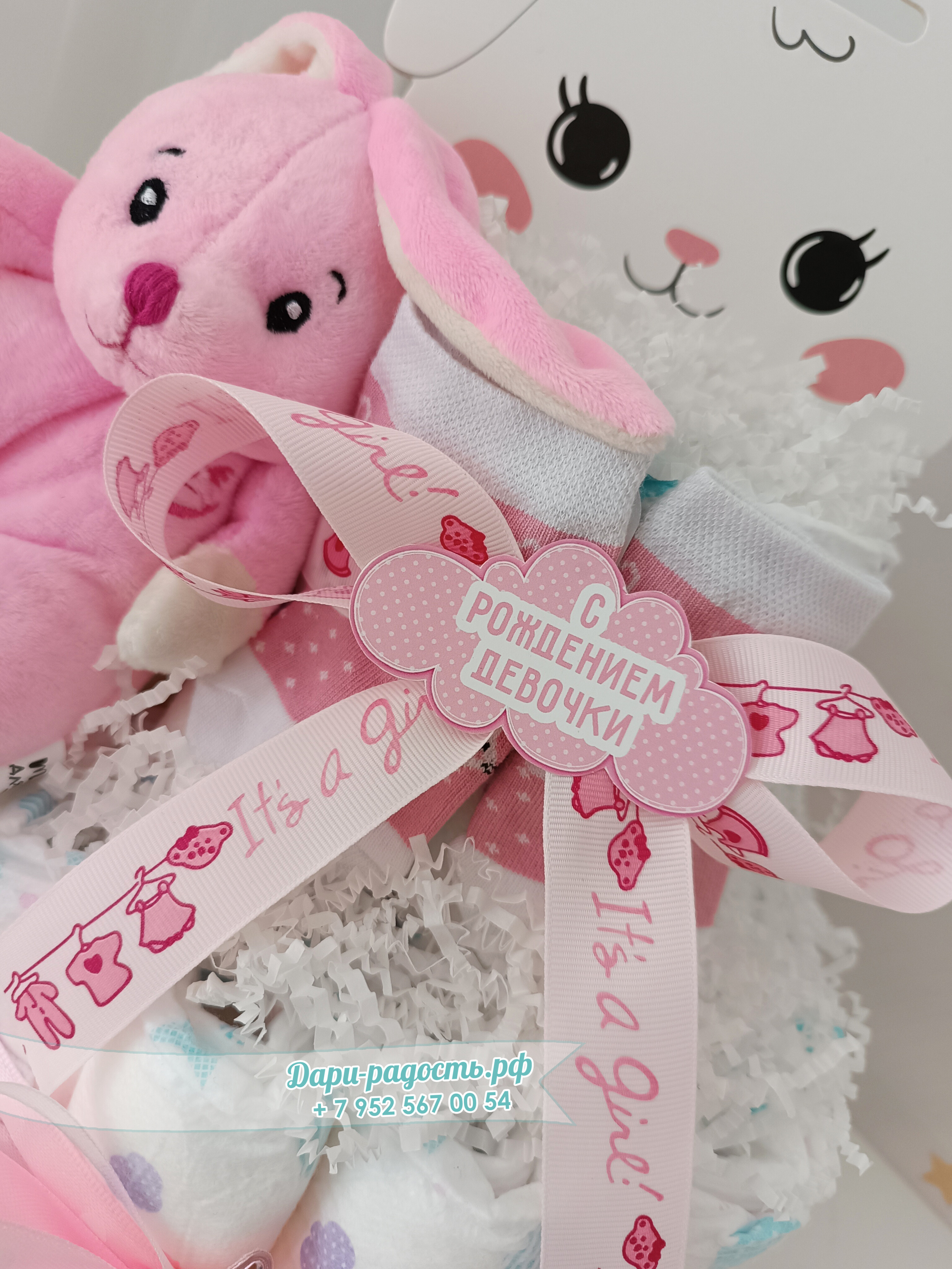 Торт из памперсов "Зайка" с игрушкой и носочками на рождение девочки