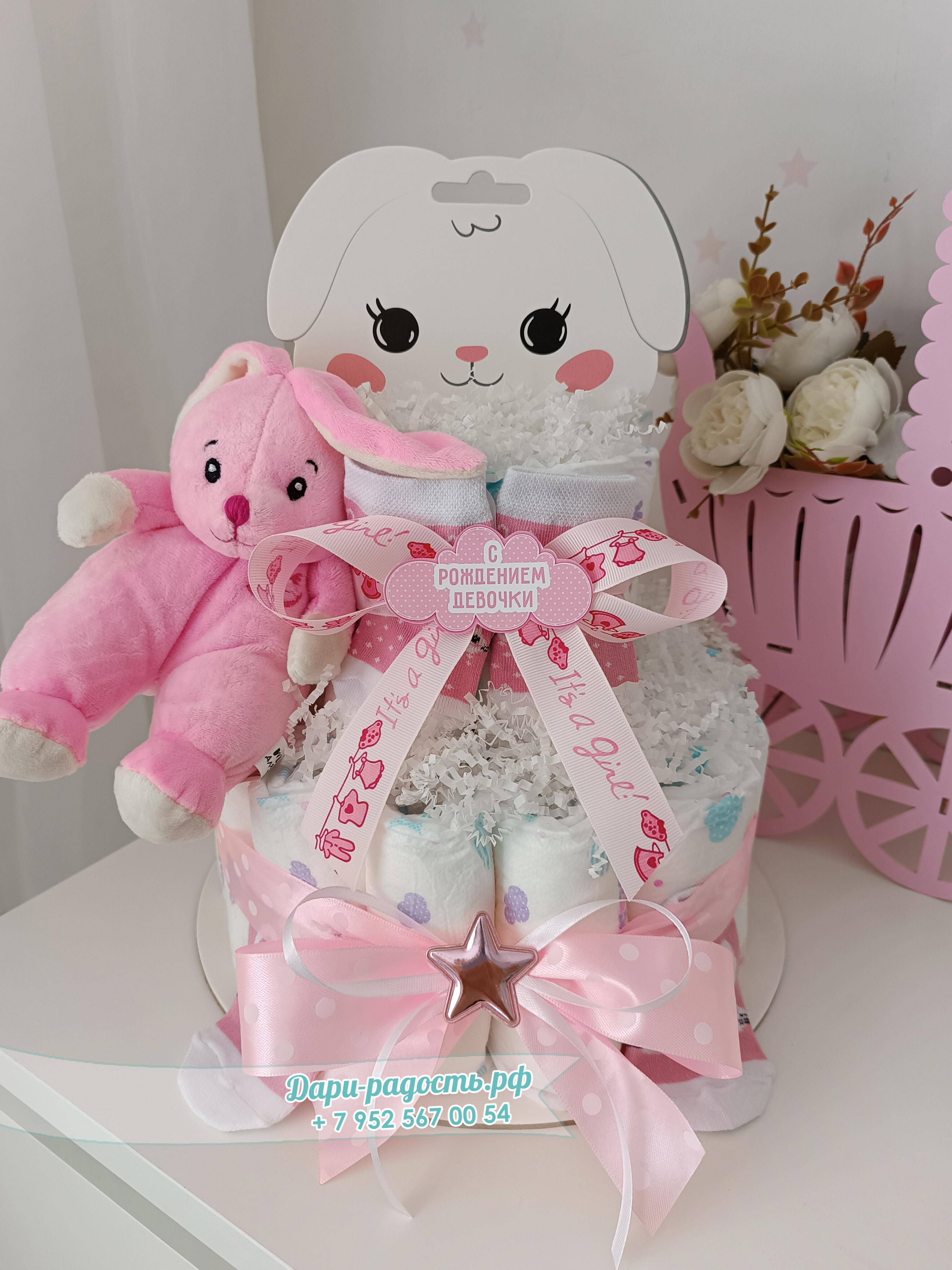 Торт из памперсов "Зайка" с игрушкой и носочками на рождение девочки