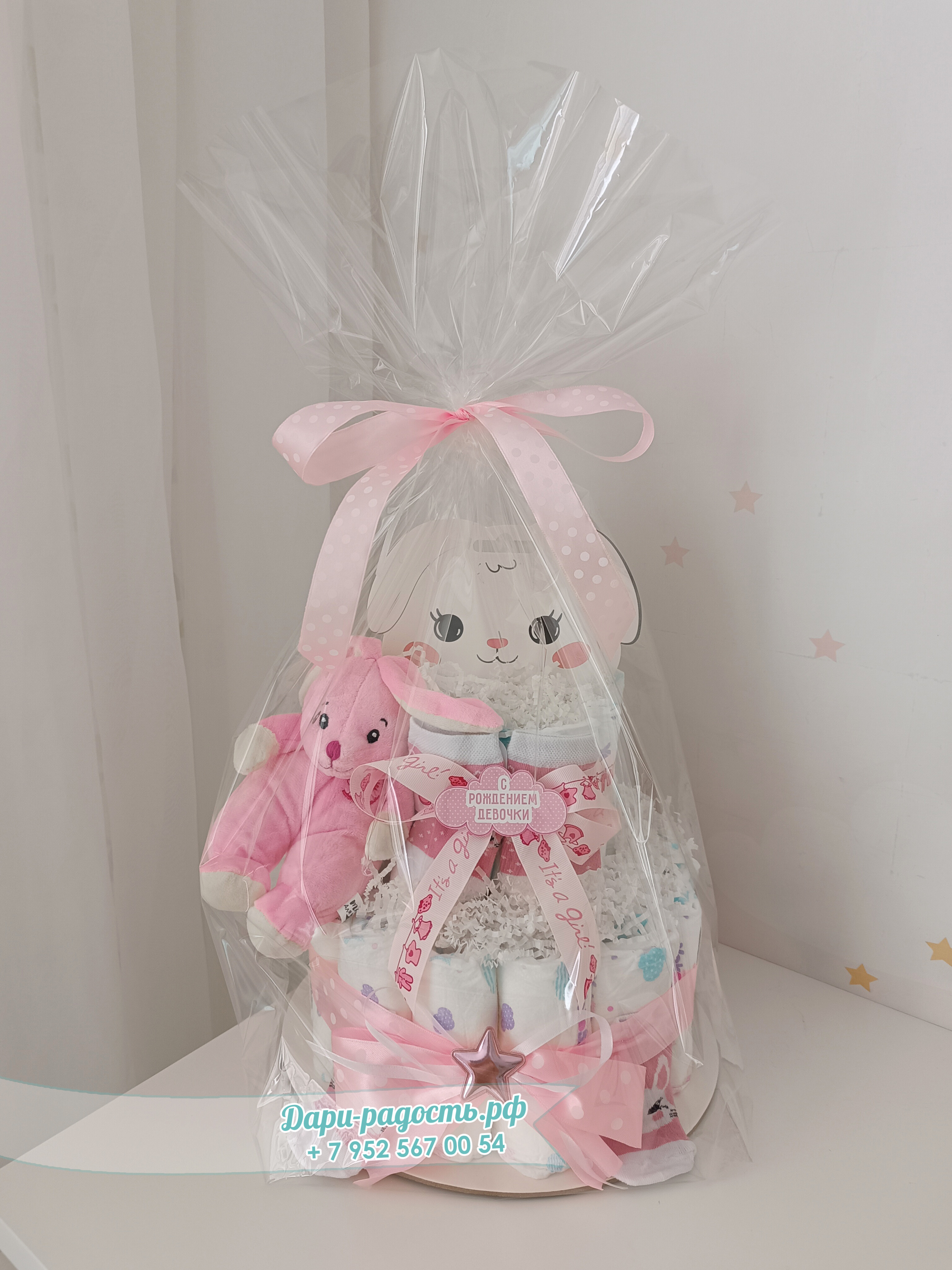 Торт из памперсов "Зайка" с игрушкой и носочками на рождение девочки