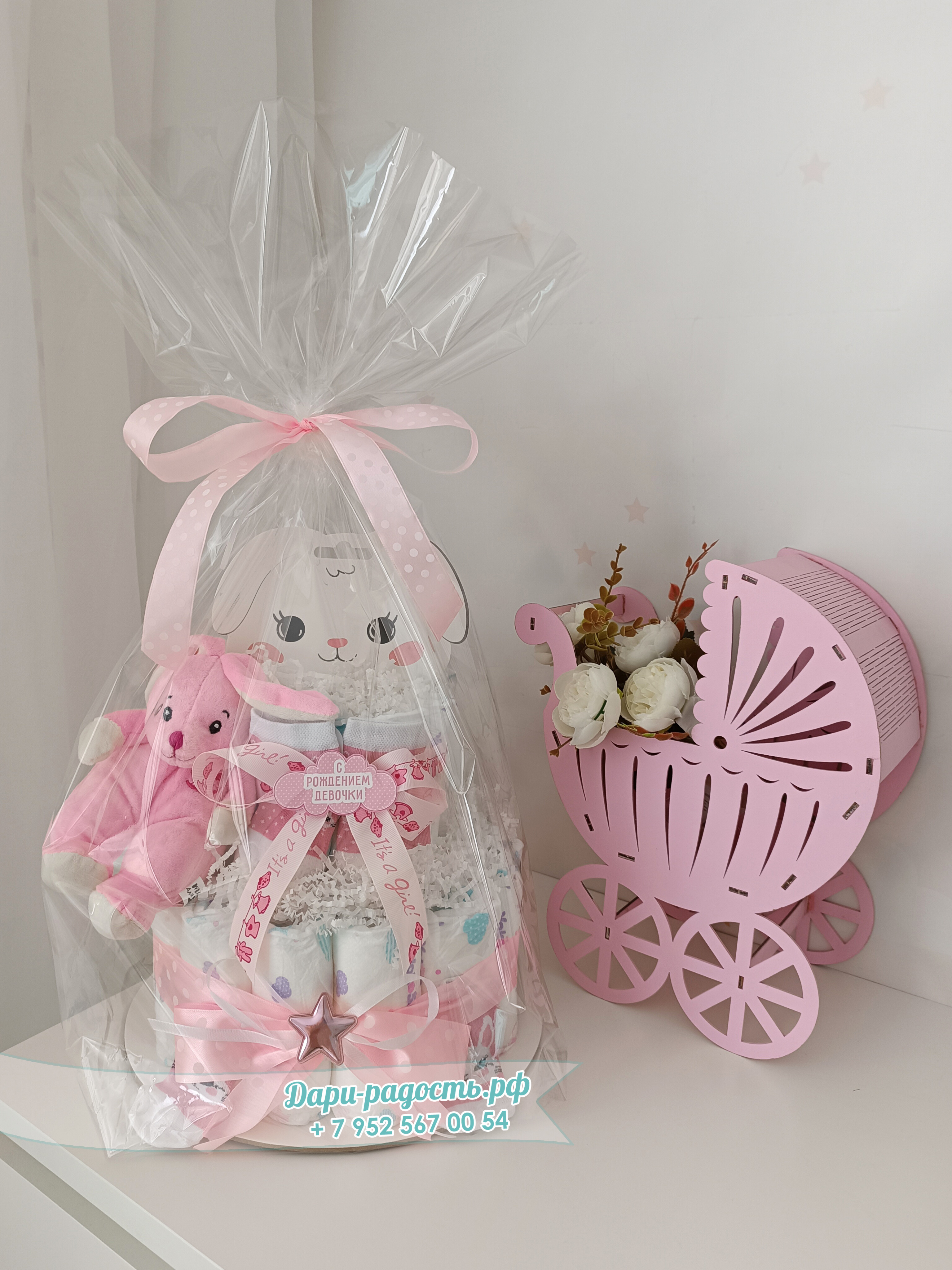 Торт из памперсов "Зайка" с игрушкой и носочками на рождение девочки