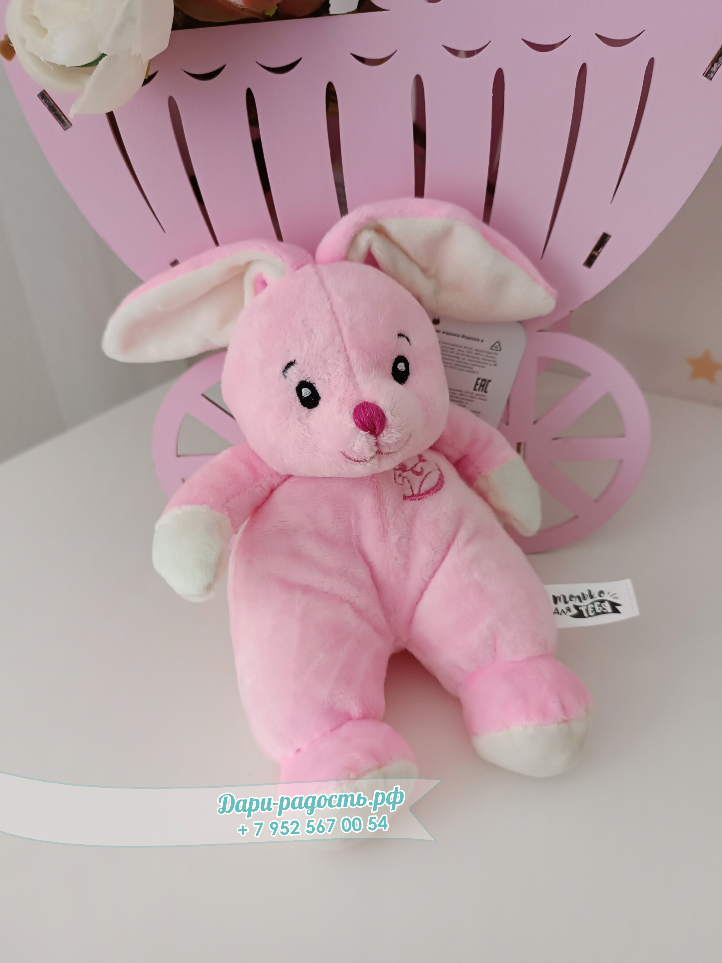 Торт из памперсов "Зайка" с игрушкой и носочками на рождение девочки