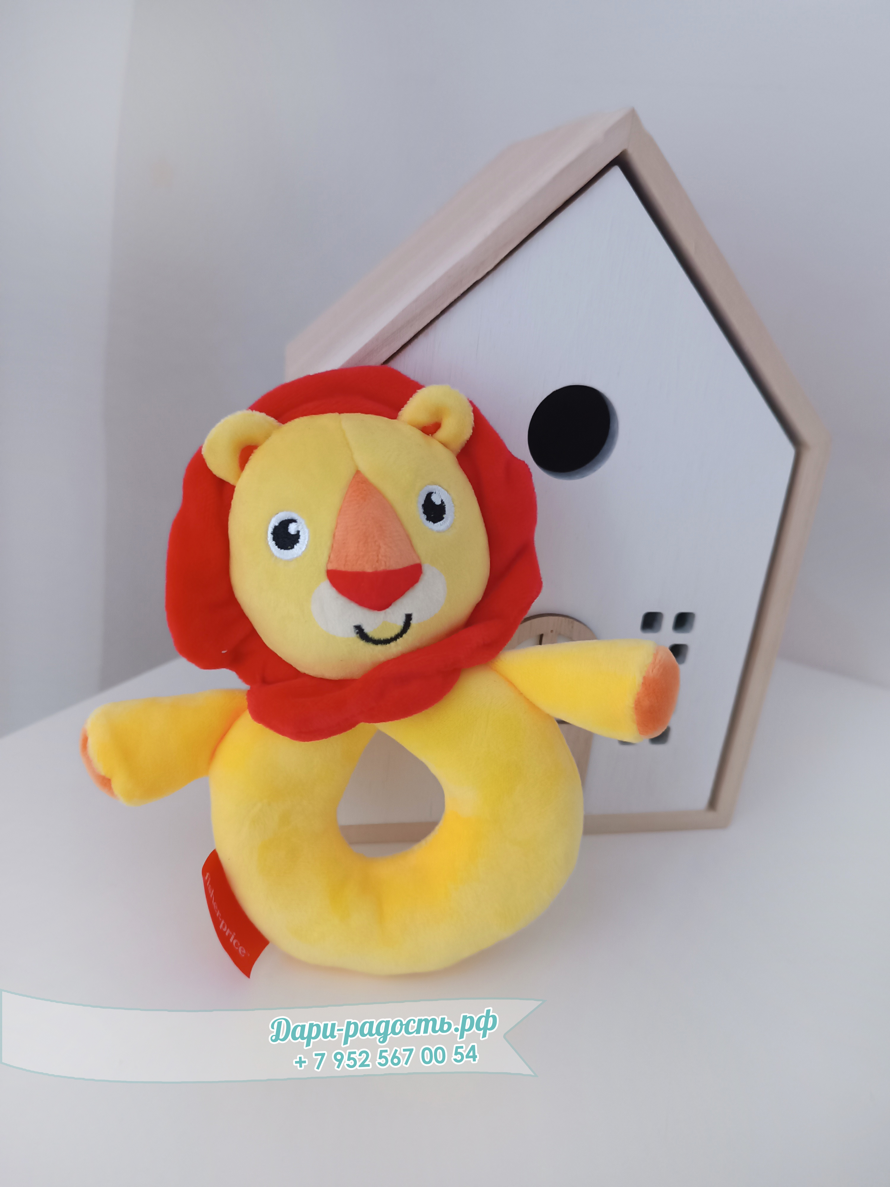 Торт из памперсов "Лёвушка" с мягкой погремушкой и носочками