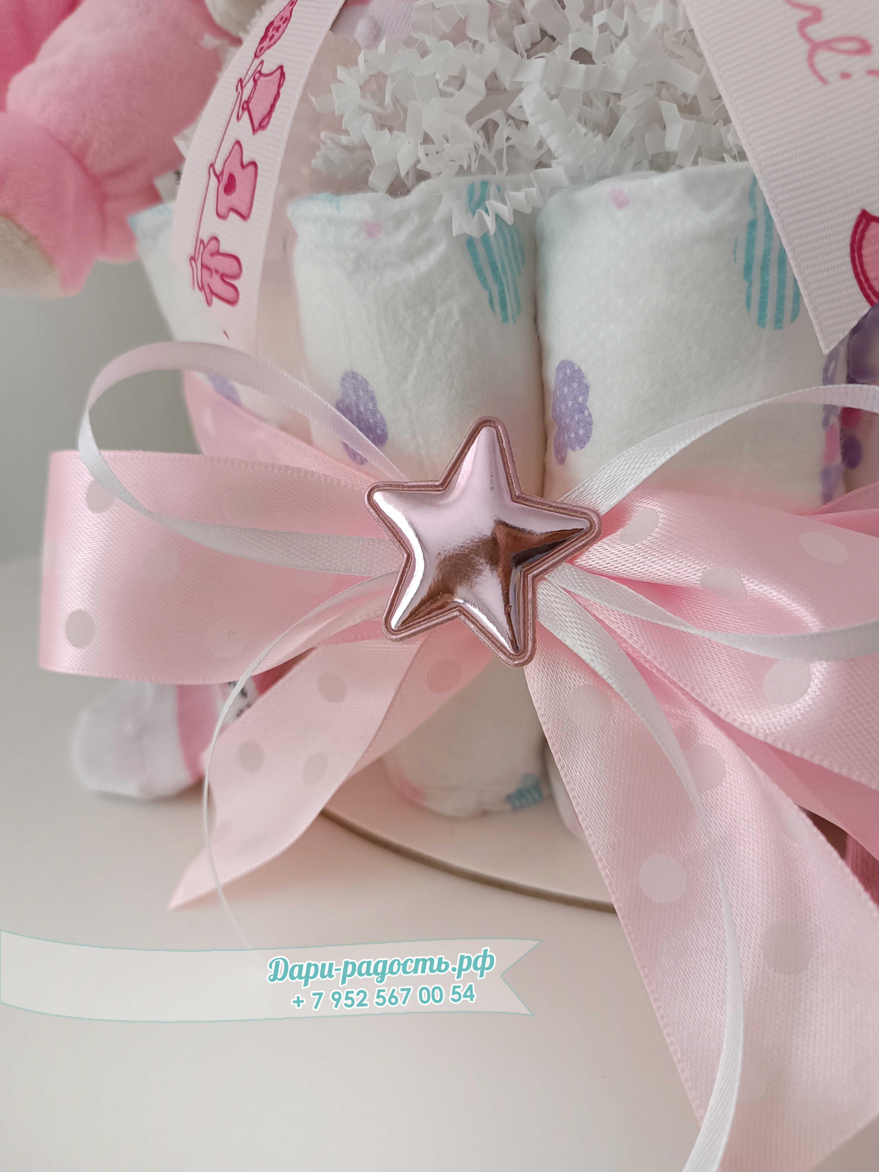 Торт из памперсов "Зайка" с игрушкой и носочками на рождение девочки