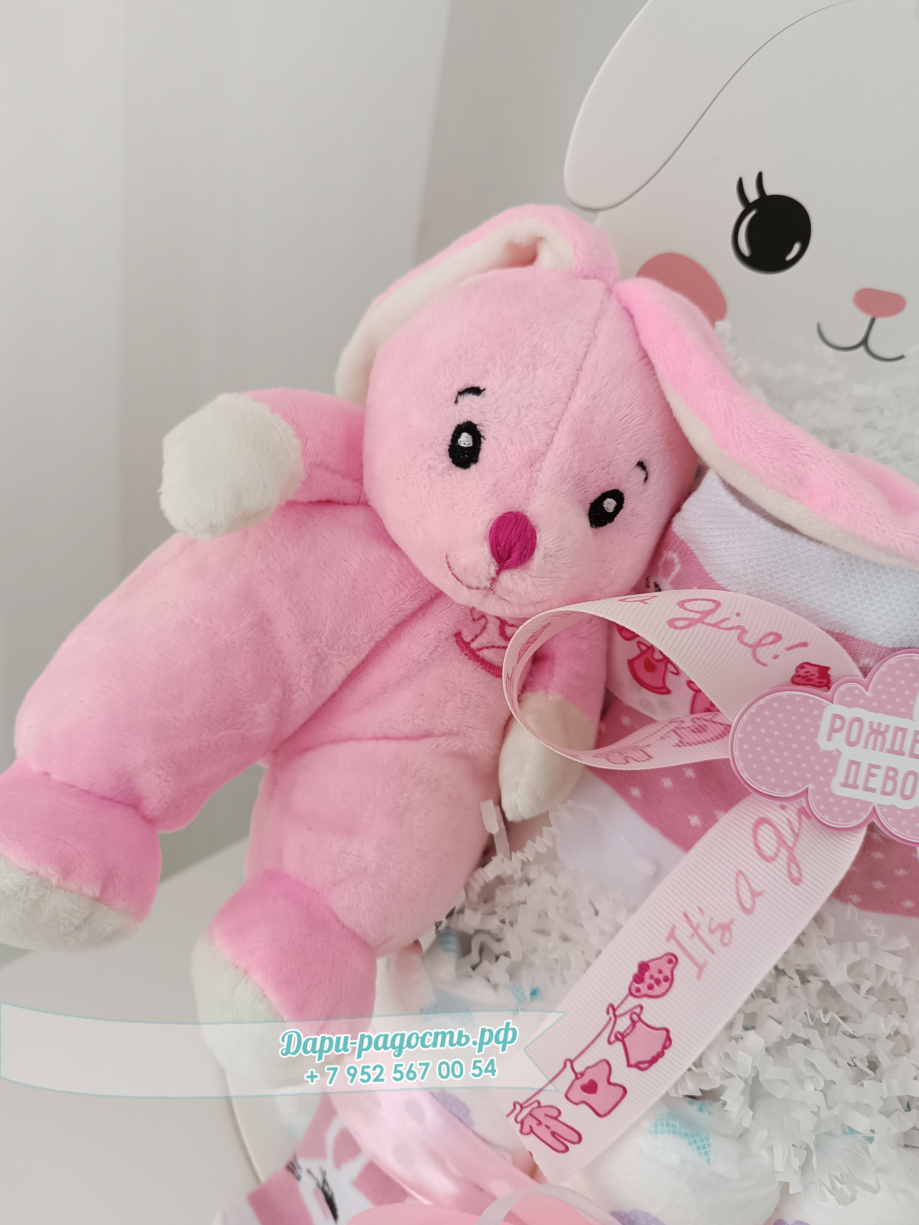 Торт из памперсов "Зайка" с игрушкой и носочками на рождение девочки